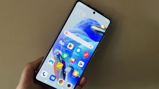 Best gaming phone 2023 - the Redmi Note 12 Pro in front of a wall